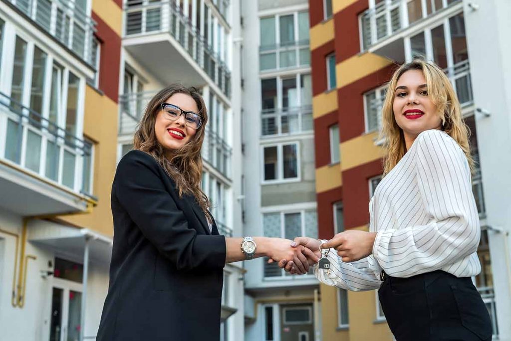 A couple of female agents Understanding the Role of Real Estate Agents