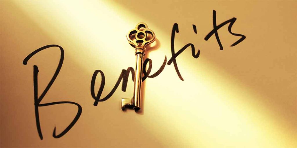 A key with a sign saying "Benefits", related to Becoming a Real Estate Sales Associate