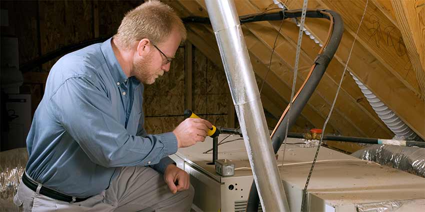 A professional working on his Florida home inspection career