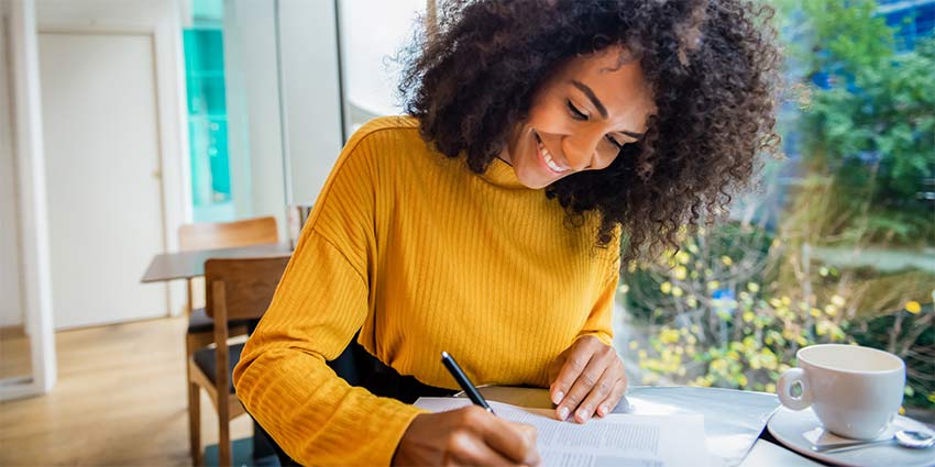 A female professional happy to know Florida Real Estate Exam