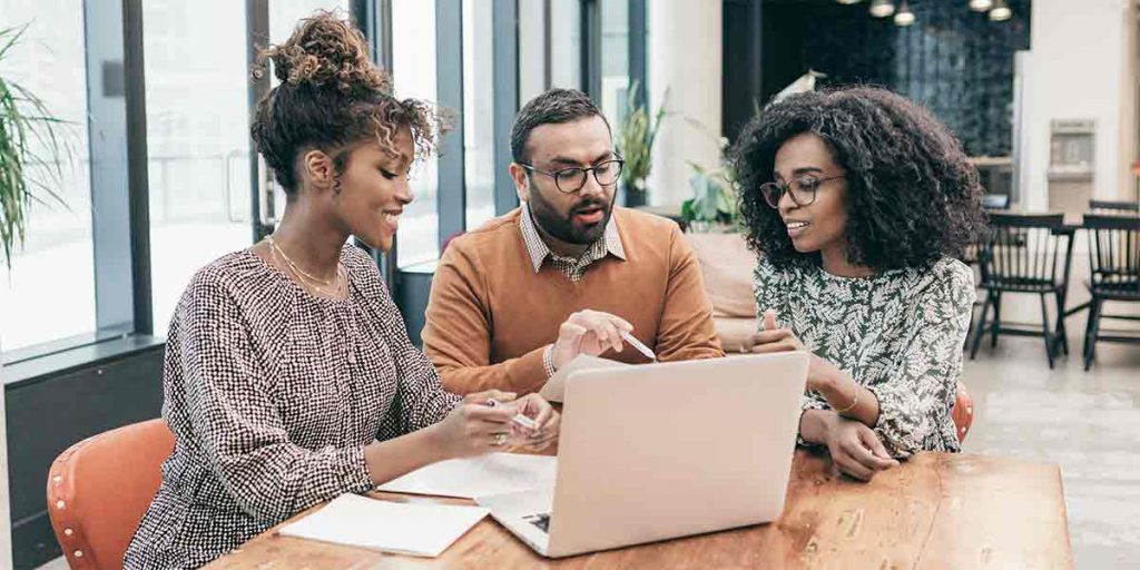 Three professionals following the Florida real estate license guide