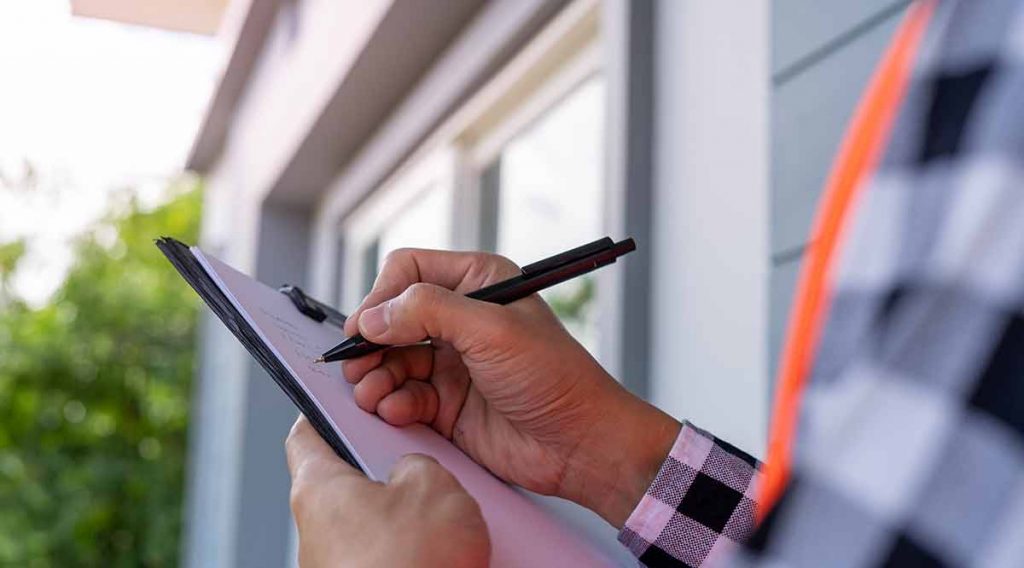 Home inspector inspecting a home