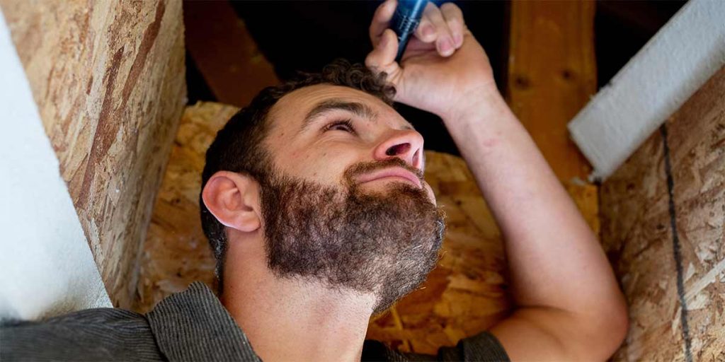 A home inspector after learning how to become a home inspector in Florida