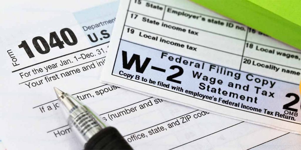 W-2 papers making sure of always meeting the IRS real estate professional standard