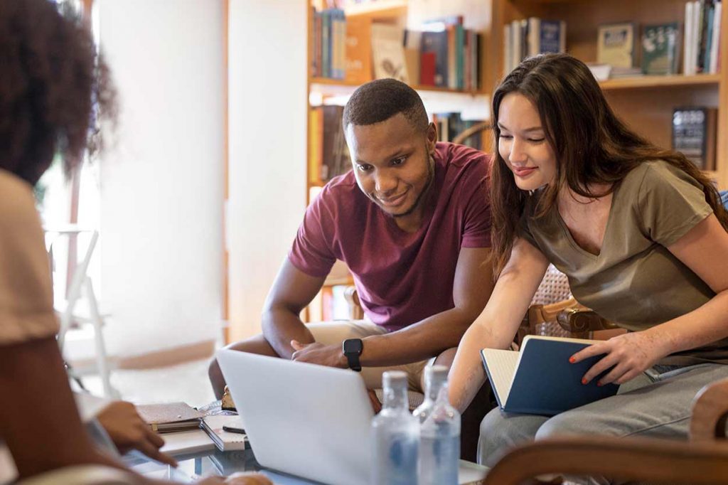 Students with books Studying to get Their Real Estate Pre-Licensing for Brokers