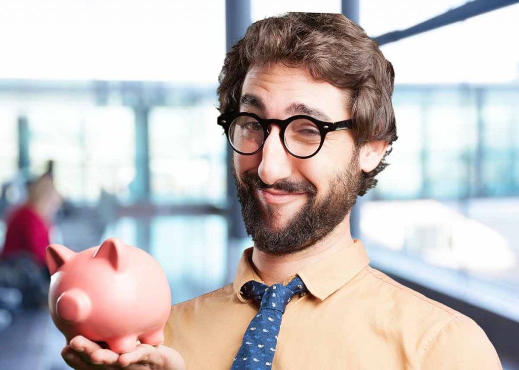 A guy happy holding a piggy bank celebrating Tax Strategies for Real Estate Professionals