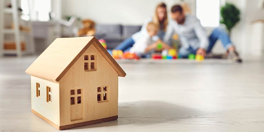 A family in the background after being helped with tips for new Mortgage Loan Originators